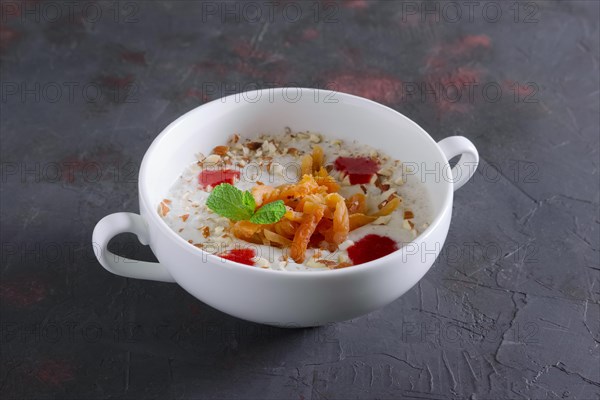 Plate of oatmeal with dried apricots