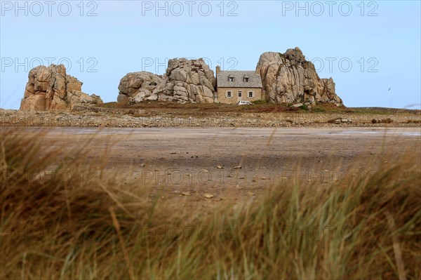 Country house between rocks near Le Gouffre