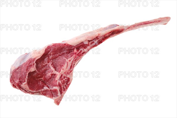 Overhead view of raw beef cowboy steak