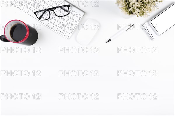 Cozy office workplace with keypad cup