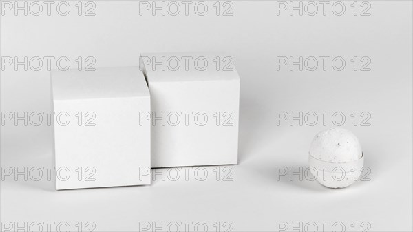 Front view white bath bomb with boxes