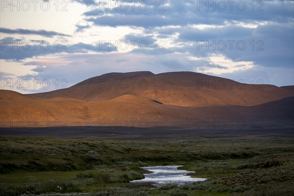 Red lit hills at sunset