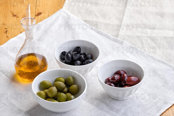 Various kinds of olives and olive oil