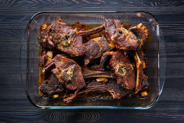 Top view of lamb meat baked in oven