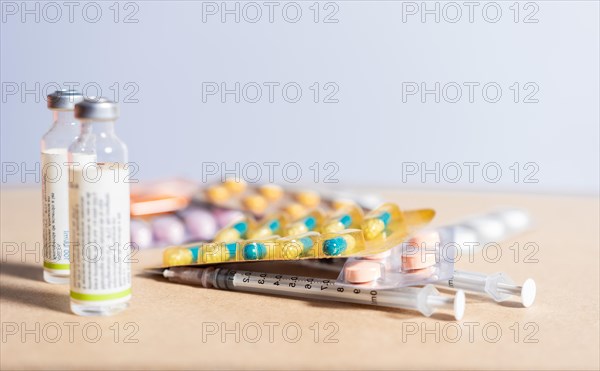 Concept of addiction to medicines and syringes. Concept of inappropriate use of medicines. Medicines