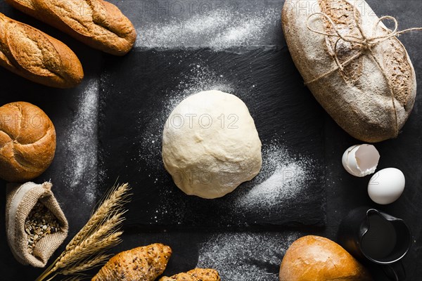 Flat lay dough bread black background