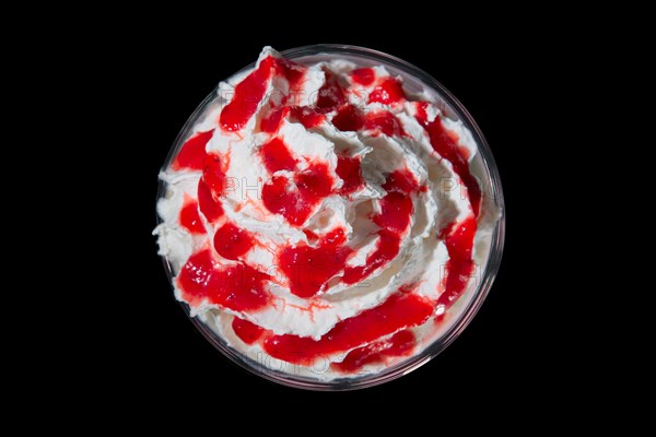 Top view of glass of smoothies isolated on black