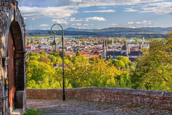 Old Way of the Cross to Frauenberg with view of St. Salvator's Cathedral and the town in early autumn