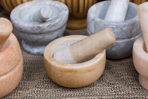 Wooden mortars and pestles as a traditional kitchenware