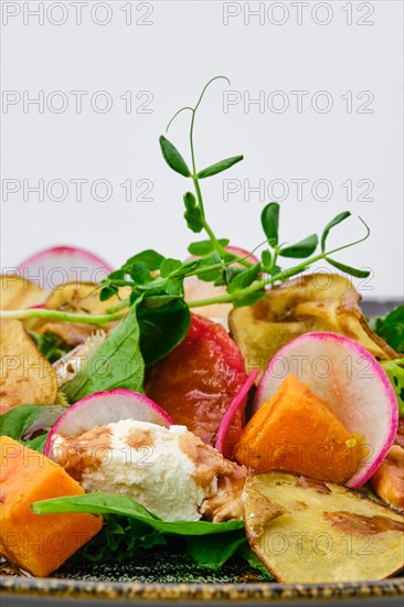 Macro photo of salad with soft cheese