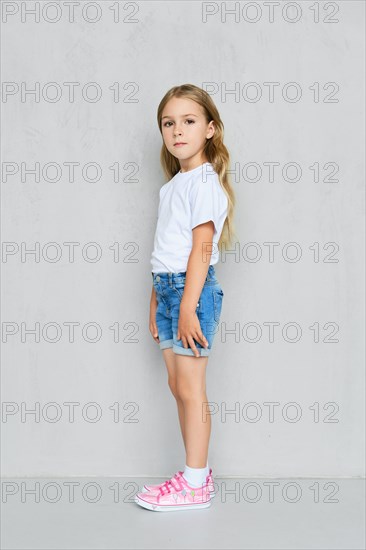 Little child girl in white t-shirt