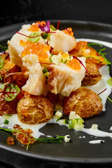 Roasted cod fillet with deep fried spring potato