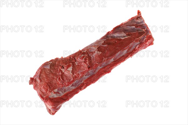 Overhead view of raw fresh beef tenderloin roast isolated on white background