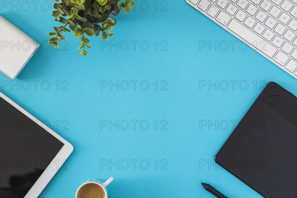 Tablet with keyboard on blue table. Resolution and high quality beautiful photo