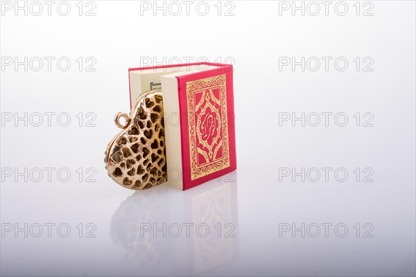 Heart shape and Islamic Holy Book Quran mini size