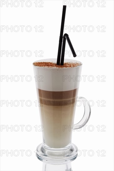 Cappuccino in tall glass isolated on white background