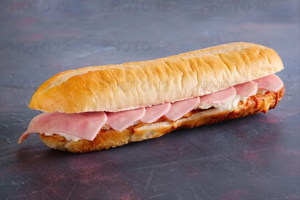Simple sandwich with ham and soft cheese