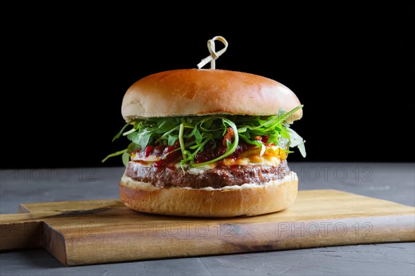 Tasty grilled beef burger with lettuce