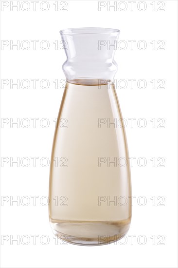 Pitcher with white wine isolated on white