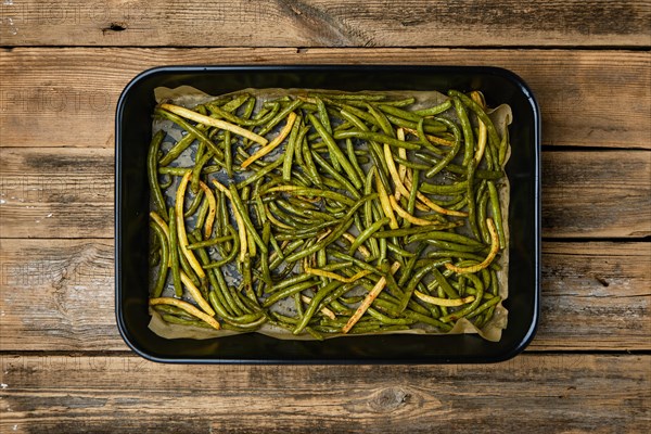 Top view of green beans baked in oven