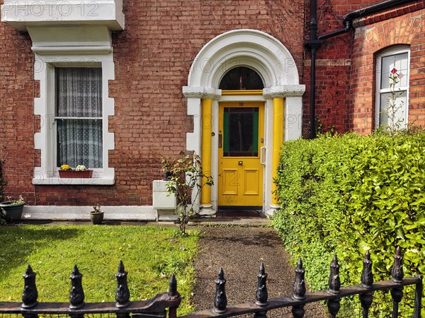 Typical terraced house with small front garden