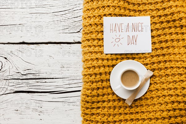 Have nice day message with cup coffee