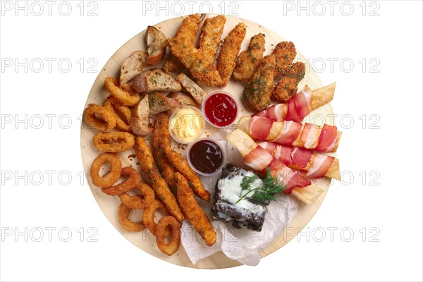 Big set of snack for beer with onion rings and carrot in breading