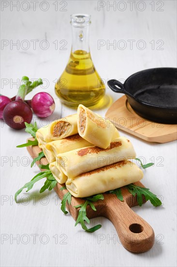 Thin crepe stuffed with chicken offal