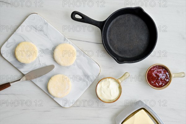 Top view of fresh cottage cheese pancake on marble serving board