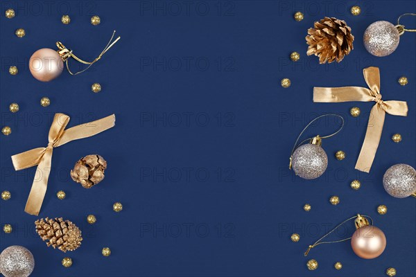 Elegant Christmas flat lay with golden and silver tree ornament baubles