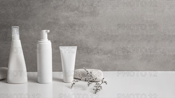 Modern beauty products recipients with copy space