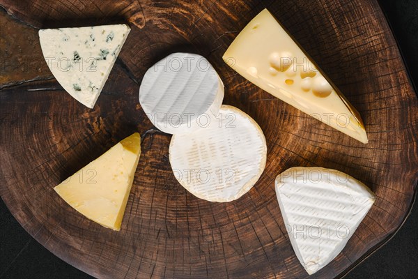 Top view of cheese platter. Assortment of brie