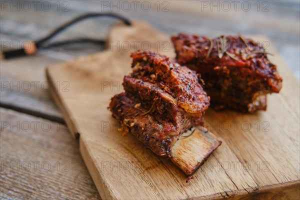 Closeup view of beef ribs baked in oven