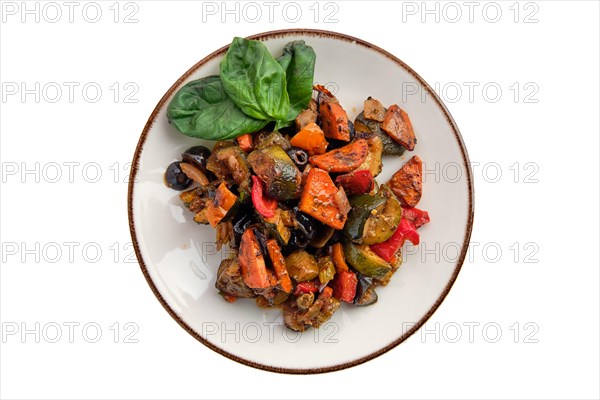 Plate with vegetable stew isolated on white background