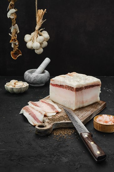 Salted pork belly lard on cutting board