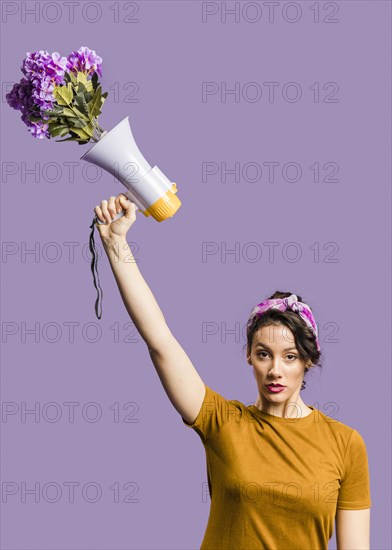 Woman holding megaphone cardboard with me too sign. Resolution and high quality beautiful photo