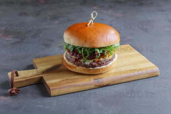 Tasty grilled beef burger with lettuce