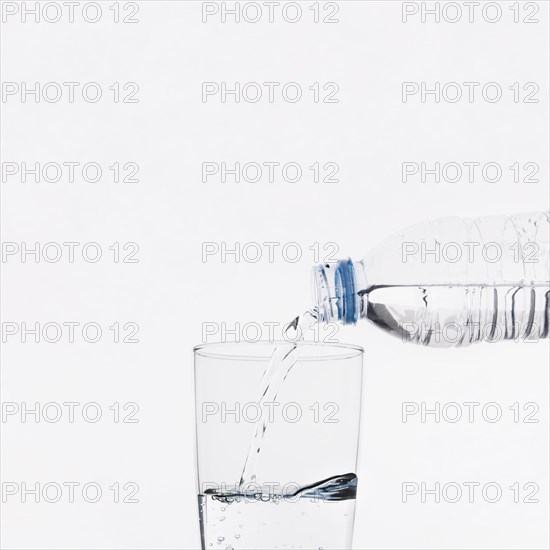 Pouring water into glass. Resolution and high quality beautiful photo