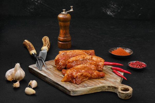 Marinated pork brisket with spice ready for barbecue