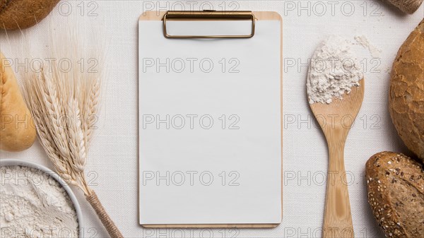 Top view breads mix with blank clipboard flour. Resolution and high quality beautiful photo