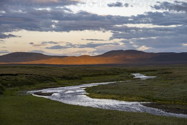 Red lit hills at sunset