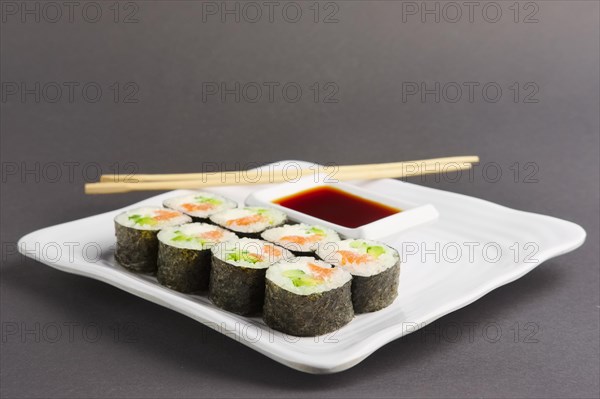 Set of rolls with salmon on plate