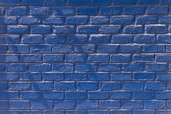 Copy space front view blue brick wall