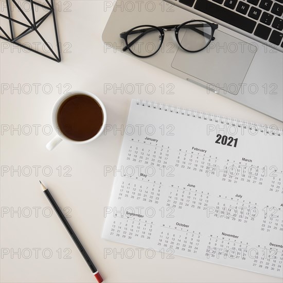 Flat lay planner calendar cup coffee