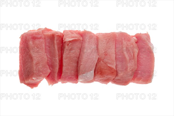 Overhead view of raw fresh pork chops isolated on white