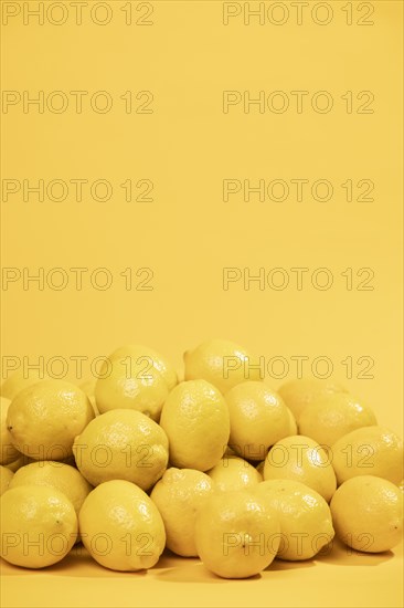 Close up bunch lemons with copy space