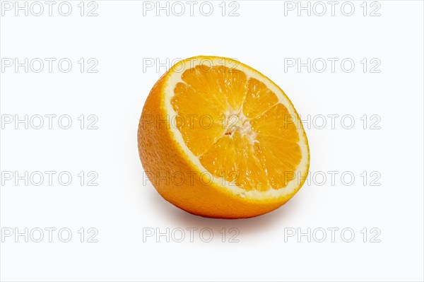 Half of orange isolated on white with shade