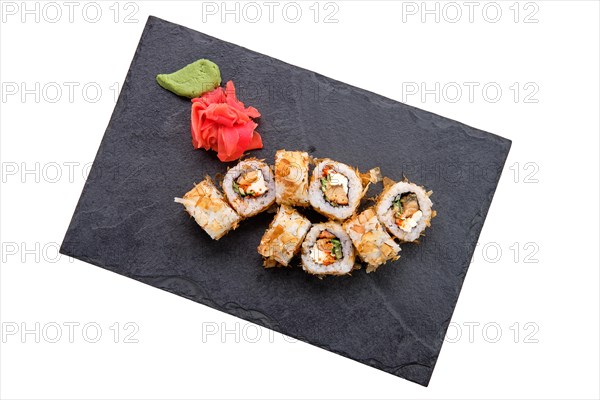 Rolls with tuna and avocado on slate plate