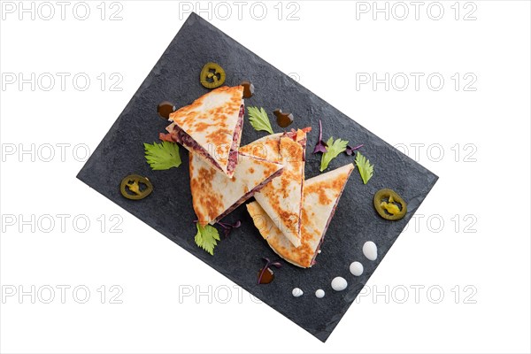 Spicy tortilla with kidney bean and red onion isolated on white background