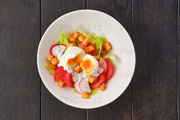 Top view of salad with fresh tomato